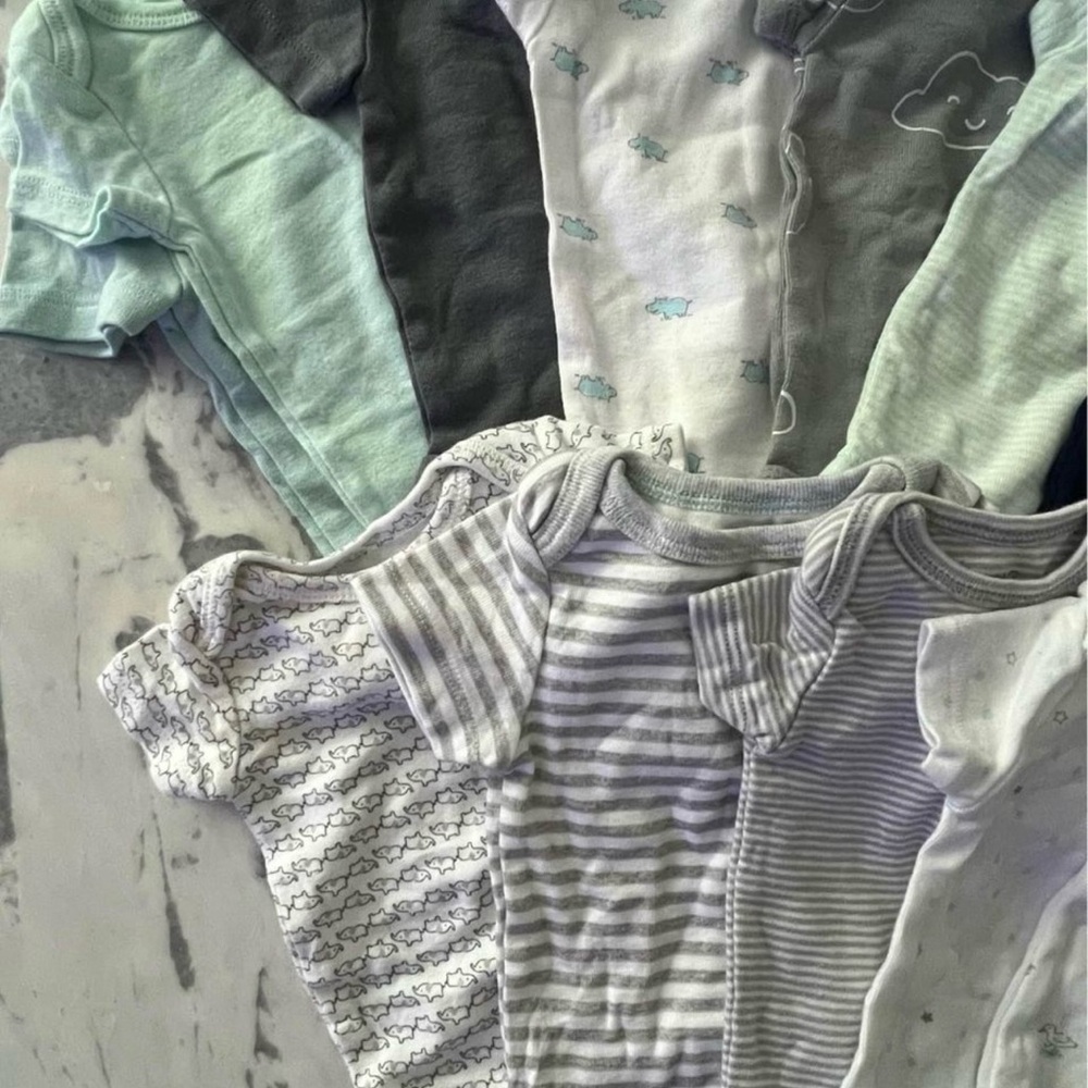 Sleepers (used),  onesies, Velcro swaddles, and knotted nighties never used